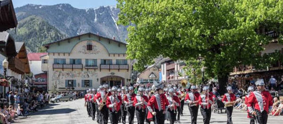 Parade at the Bavarian Celebration of Spring festival in Leavenworth, Washington.  This once-thriving hub of the Great Northern Railroad lost the railroad and declined until the early 1960s, when townfolk -- meeting with and learning from the burghers of Swiss-themed Solvang, California -- adopted a theme of their own and turned the town into a thriving, Bavarian-modeled tourist attraction.